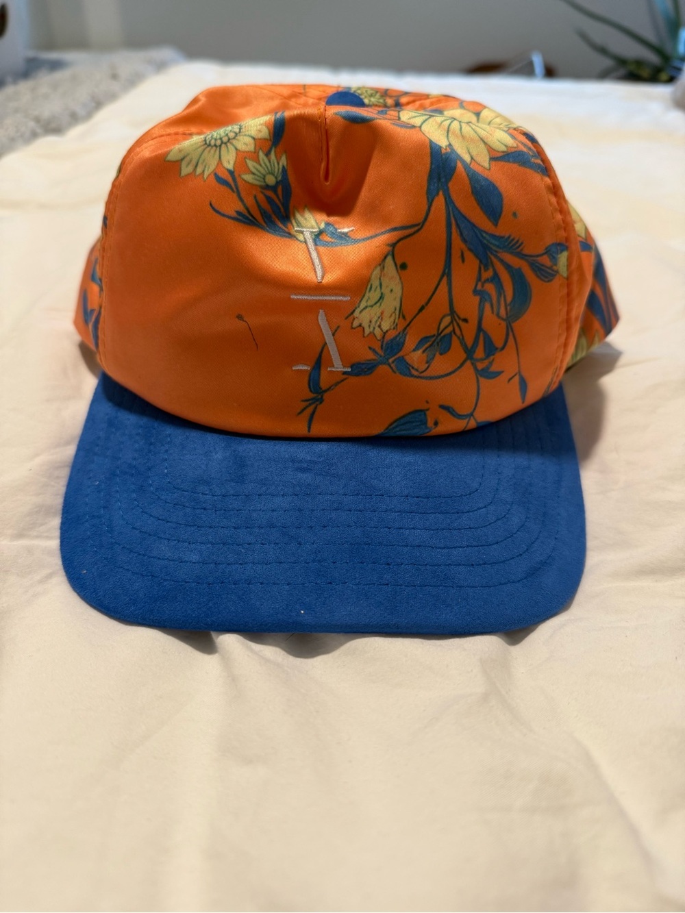 Lane 8 2026 Merch: Floral Orange and Blue Cap